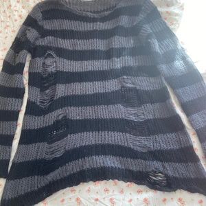 Striped ripped sweater